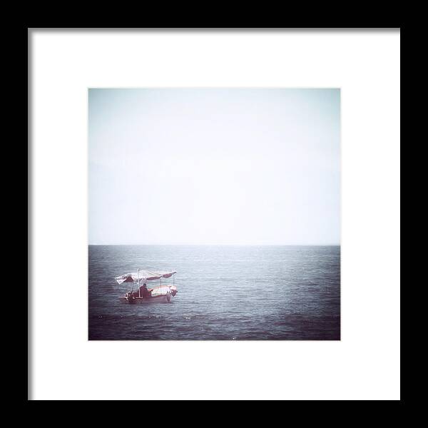 Ocean Framed Print featuring the photograph El Pescador Solitario #2 by Natasha Marco