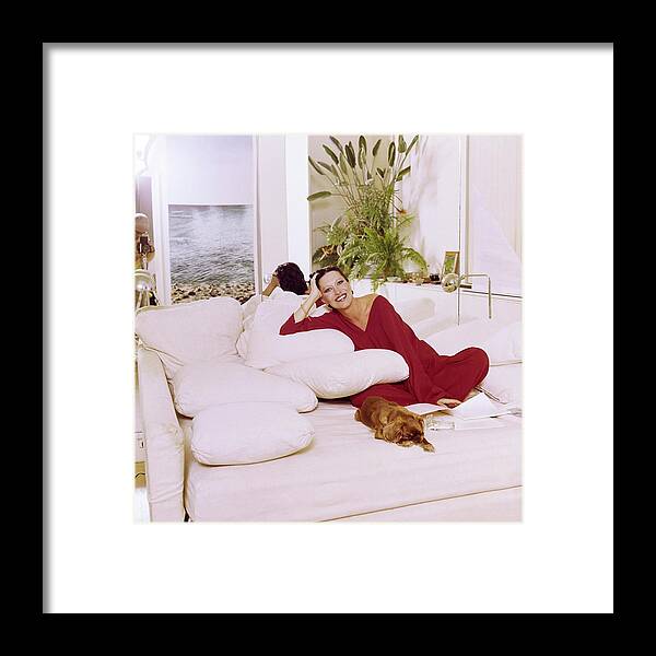 Dog Framed Print featuring the photograph Elsa Peretti Wearing Halston Pajamas by Horst P. Horst