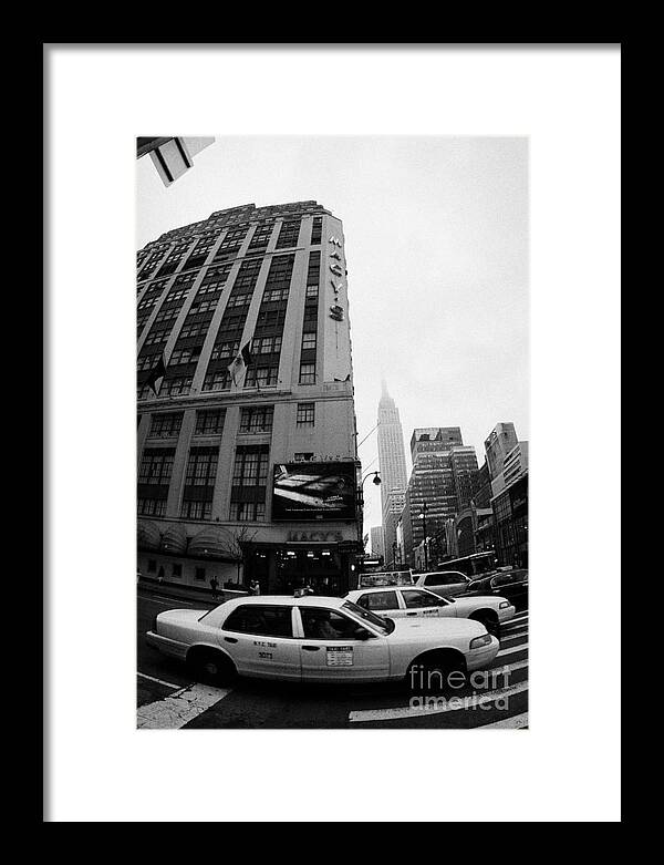 Usa Framed Print featuring the photograph Empire State Building Shrouded In Mist As Yellow Cabs Crossing Crosswalk On 7th Ave And 34th Street #1 by Joe Fox