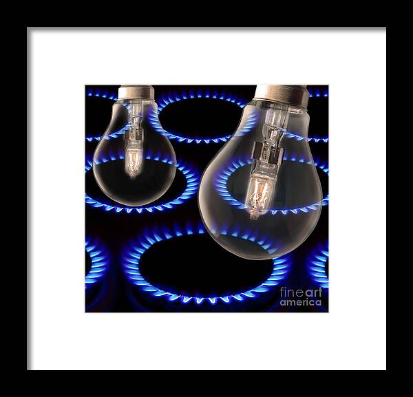 Light Bulb Framed Print featuring the photograph Energy Use, Conceptual Image #1 by Victor De Schwanberg