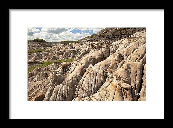 Hoodoos Of Drumheller Framed Print featuring the photograph Erosion #1 by Angelito De Jesus