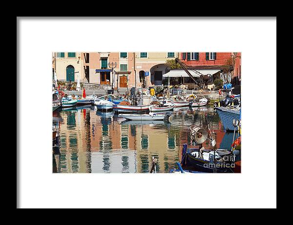 Boat Framed Print featuring the photograph fishing boats in Camogli #1 by Antonio Scarpi