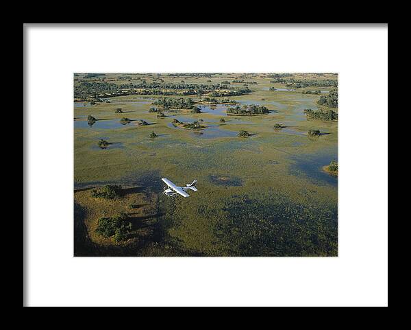 Feb0514 Framed Print featuring the photograph Flight Safari Okavango Delta Botswana #1 by Konrad Wothe