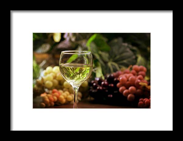 Glass Framed Print featuring the photograph Glass and Grapes by Mark McKinney