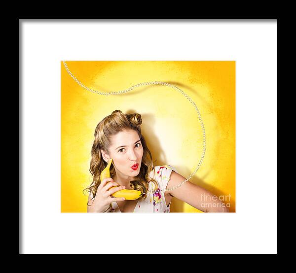 Comic Framed Print featuring the photograph Gossiping retro pin up girl on fruit phone #1 by Jorgo Photography