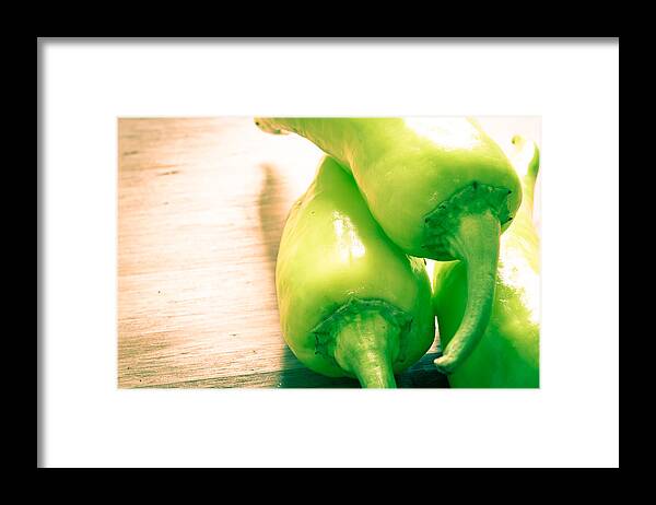 Board Framed Print featuring the photograph Green jalapeno peppers #1 by Tom Gowanlock