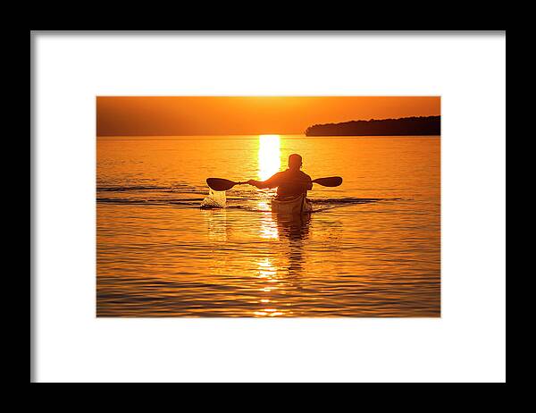 Apostle Islands National Lakeshore Framed Print featuring the photograph Kayaking At Sunset In The Apostle #1 by Chuck Haney