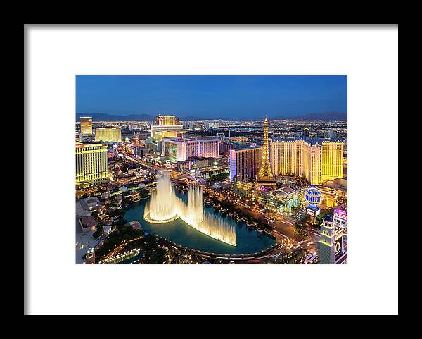 Las Vegas Replica Eiffel Tower Framed Print featuring the photograph Las Vegas Skyline At Dusk #1 by Sylvain Sonnet
