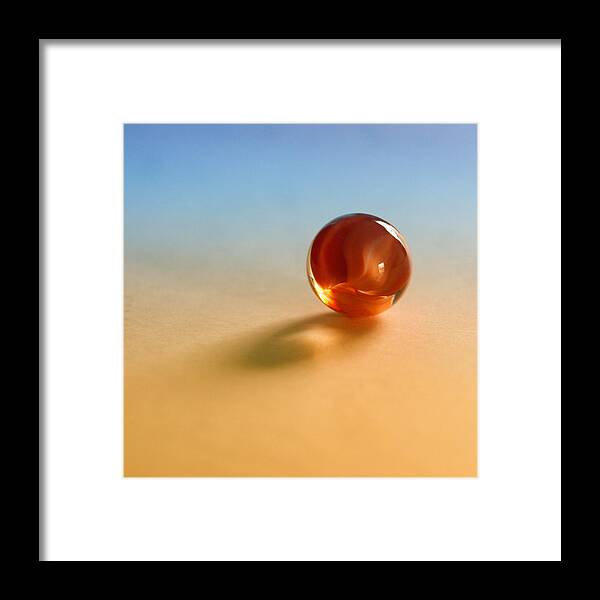 1 Lost Marble Framed Print featuring the photograph 1 Lost Marble by Tom Druin