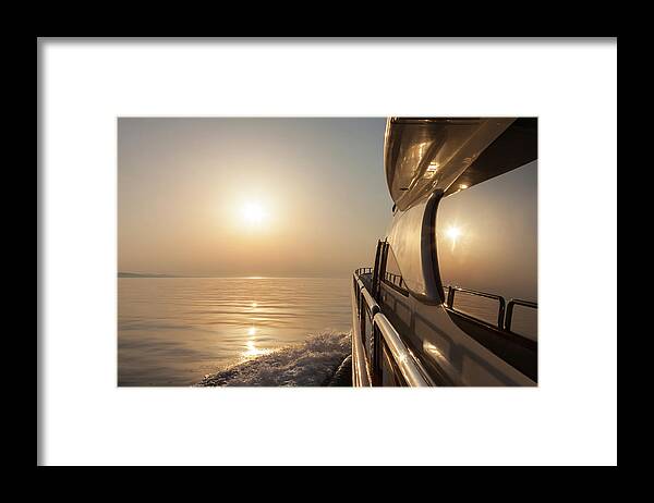 Motorboat Framed Print featuring the photograph Luxury Motor Yacht Sailing At Sunset #1 by Petreplesea