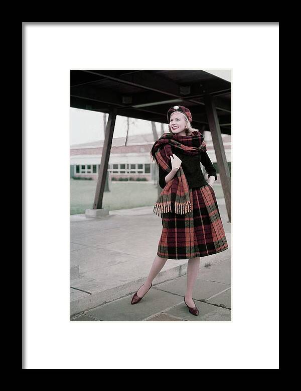 One Person Framed Print featuring the photograph Model Standing Underneath A Breezeway In A Plaid #1 by Frances McLaughlin-Gill