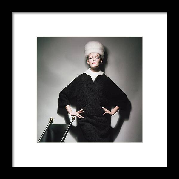 Studio Shot Framed Print featuring the photograph Model Wearing Mink Hat #1 by Horst P. Horst