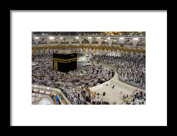 People Framed Print featuring the photograph Muslim pilgrims circumambulate or tawaf the Kaabah after Subuh prayer at Masjidil Haram by Shaifulzamri