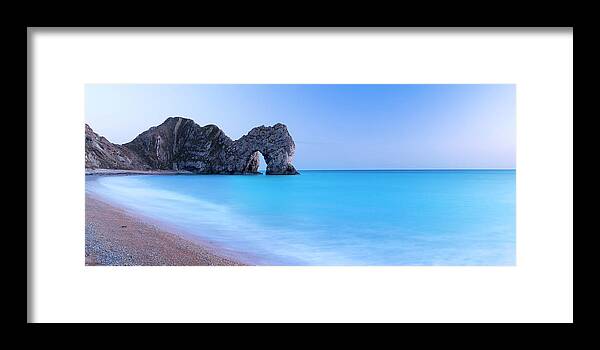 Water's Edge Framed Print featuring the photograph Natural Stone Arch, Dorset, Uk #1 by Travelpix Ltd