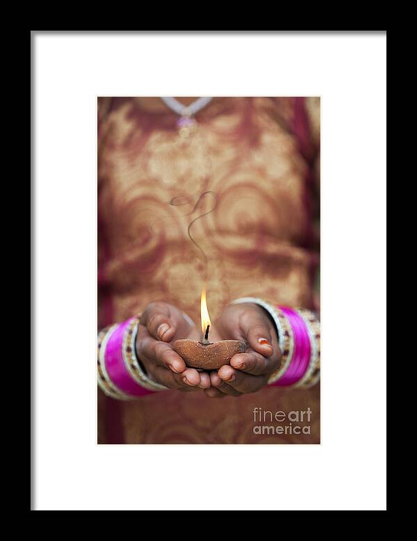 Indian Girl Framed Print featuring the photograph Offering the light by Tim Gainey