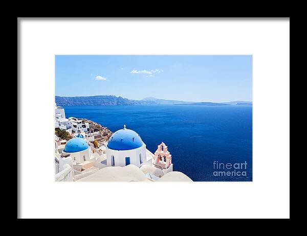 Santorini Framed Print featuring the photograph Oia town on Santorini island Greece #1 by Michal Bednarek