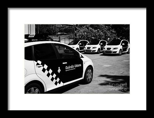 Policia Framed Print featuring the photograph policia guardia urbana patrol cars Barcelona Catalonia Spain #1 by Joe Fox