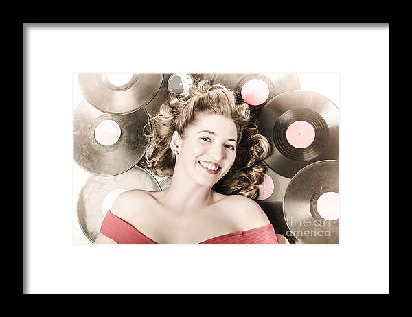 Pin-up Framed Print featuring the photograph Retro pin-up woman with rocking hairstyle #1 by Jorgo Photography