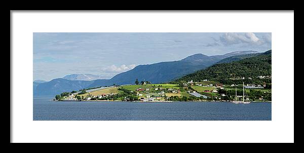 Photography Framed Print featuring the photograph Scenic View Of Village At Seaside #1 by Panoramic Images
