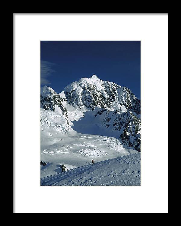 Feb0514 Framed Print featuring the photograph Ski Mountaineer And Mt Tasman #1 by Colin Monteath