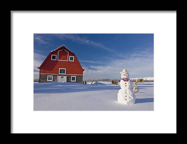 Field Framed Print featuring the photograph Snowman Dressed Up As A Cowboy Standing #1 by Kevin Smith