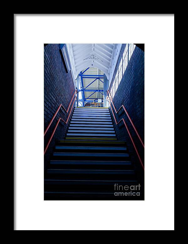 Britain Framed Print featuring the photograph Steps up leading from dark to light with red hand rail. #2 by Peter Noyce