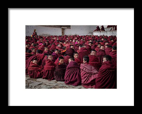 Gansu Province Framed Print featuring the photograph Tibetan Buddhists Celebrate Religion #1 by Kevin Frayer