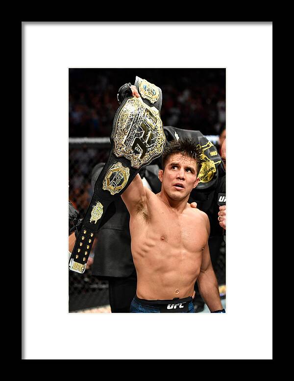 Event Framed Print featuring the photograph UFC 227: Johnson v Cejudo 2 #1 by Jeff Bottari