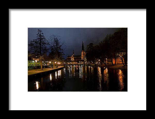 Uppsala By Night Framed Print featuring the photograph Uppsala by night by Torbjorn Swenelius