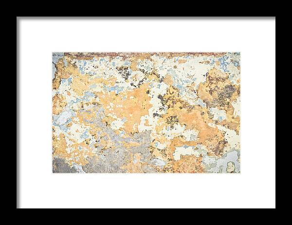 .grungy Framed Print featuring the photograph Weathered wall #1 by Tom Gowanlock