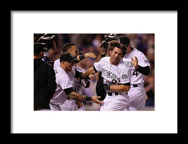 Celebration Framed Print featuring the photograph New York Mets V Colorado Rockies by Doug Pensinger
