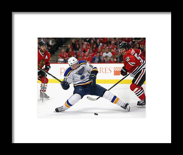 United Center Framed Print featuring the photograph St Louis Blues v Chicago Blackhawks #14 by Jonathan Daniel