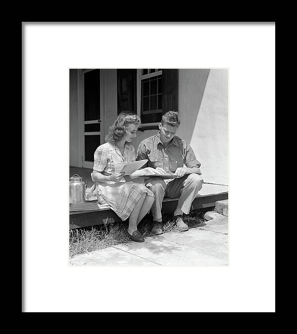 Photography Framed Print featuring the photograph 1940s Young Couple Man Woman Sitting by Vintage Images