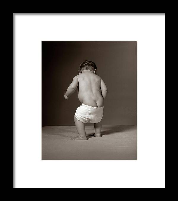 Photography Framed Print featuring the photograph 1960s Baby Standing With Diaper Falling by Vintage Images