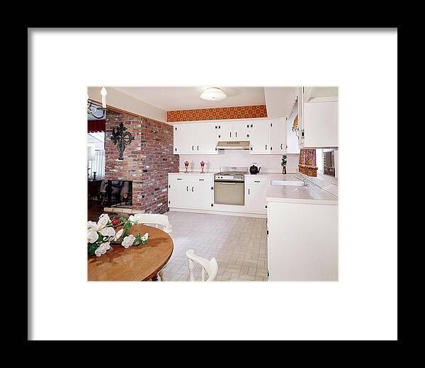 1960s Kitchen Interior With Brick Wall Framed Print