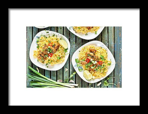 Background Framed Print featuring the photograph Chicken noodles #2 by Tom Gowanlock