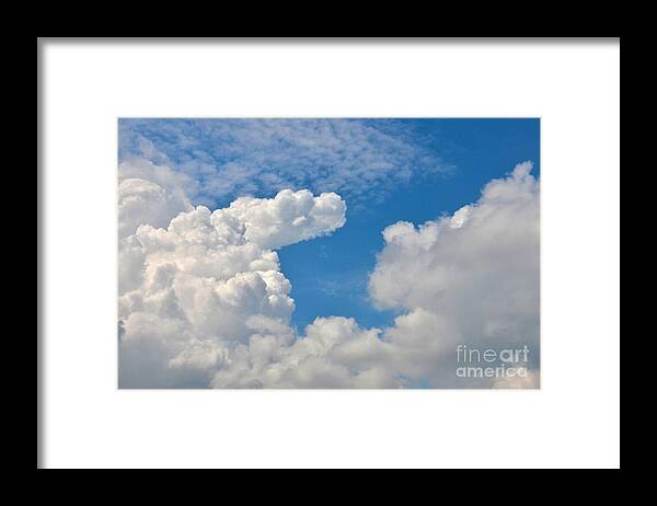 Abstract Framed Print featuring the photograph Clouds in the sky by Imran Ahmed