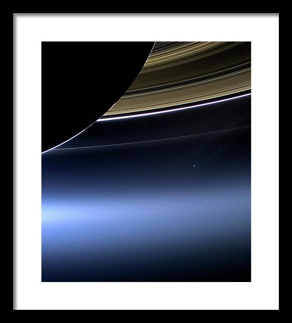 Earth And Moon From Saturn by Nasa