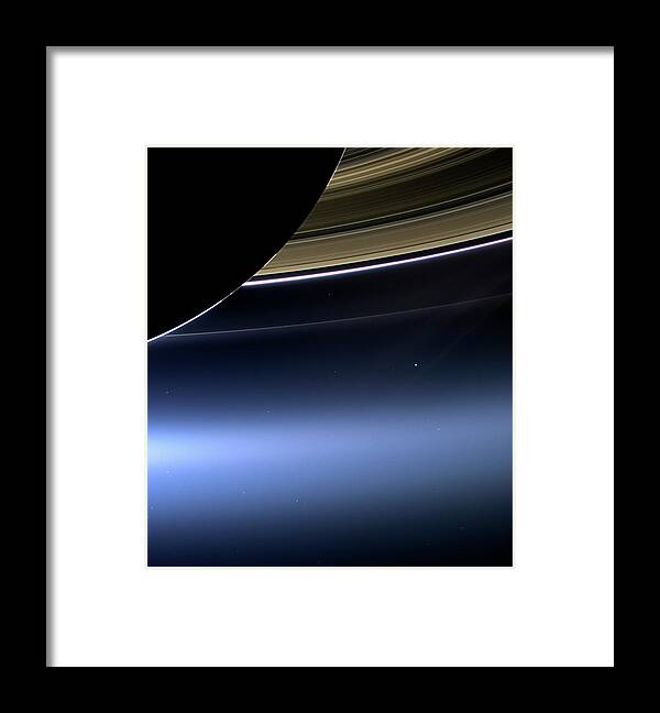 Astronomy Framed Print featuring the photograph Earth And Moon From Saturn by Nasa