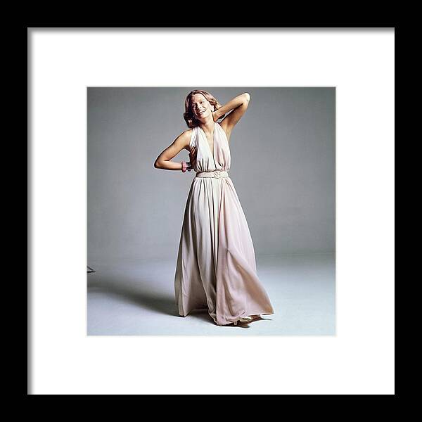 Accessories Framed Print featuring the photograph Lauren Hutton Wearing A Galanos Dress by Bert Stern