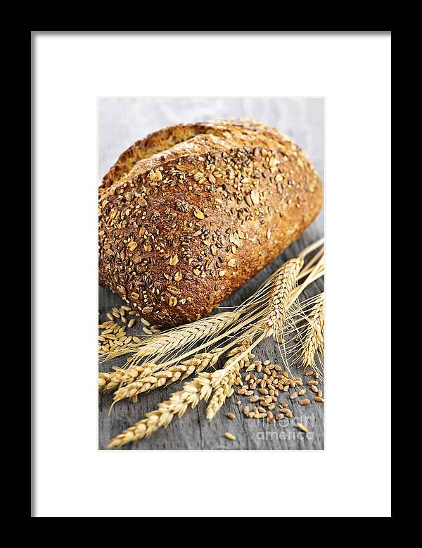 Bread Framed Print featuring the photograph Loaf of multigrain bread 2 by Elena Elisseeva