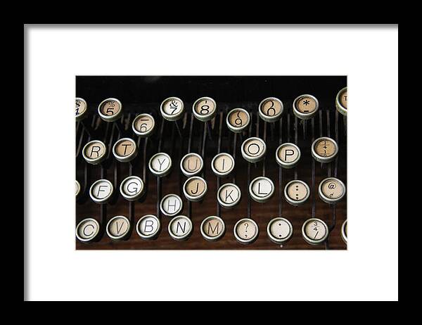 Typewriter Framed Print featuring the photograph Old Keys by Laurie Perry
