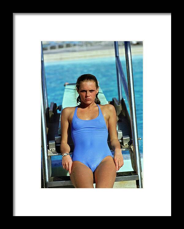 Swimwear Framed Print featuring the photograph Patti Hansen Wearing A Blue Swimsuit #2 by Arthur Elgort