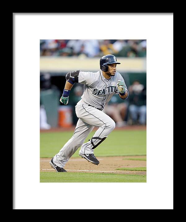 American League Baseball Framed Print featuring the photograph Seattle Mariners V Oakland Athletics by Ezra Shaw