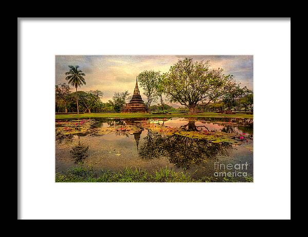 Sukhothai Historical Park Framed Print featuring the photograph Sukhothai Historical Park #1 by Adrian Evans