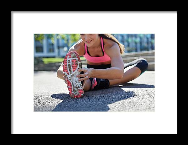 Woman Stretches Before Running Framed Print, Stretches To Do Before  Running