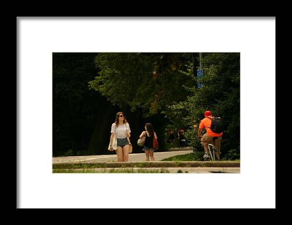 Prospect Framed Print featuring the photograph Girls walking and a biker by Eric Brock