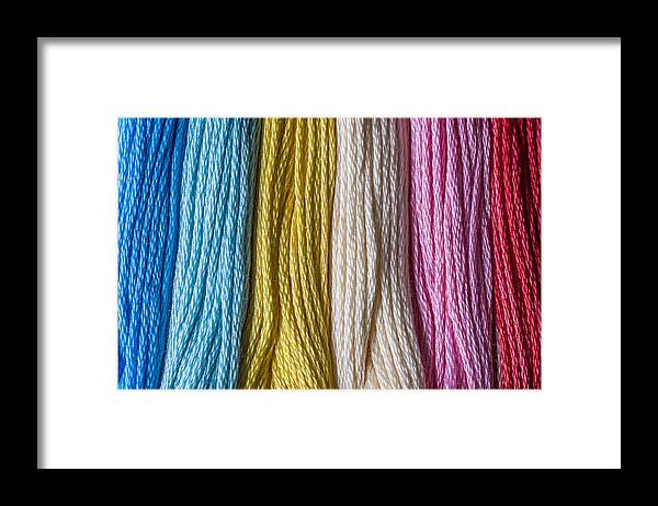 Arts Backgrounds Framed Print featuring the photograph Multicolored floss #3 by Paulo Goncalves