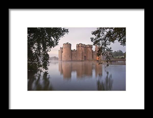 Castle Framed Print featuring the photograph Stunning moat and castle in Autumn Fall sunrise with mist over m #3 by Matthew Gibson