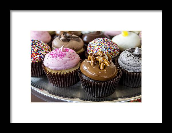 Assorted Cupcakes Framed Print featuring the photograph Assorted Flavors of Cupcake on Display #4 by Teri Virbickis